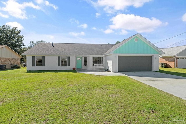 single story home with driveway, a garage, a front lawn, central AC, and brick siding