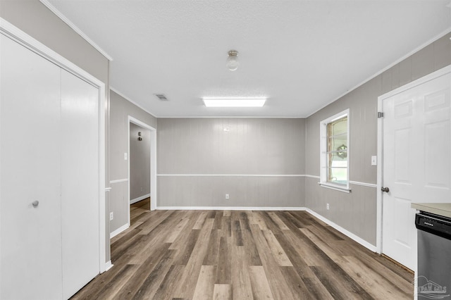 2382 Ryale Rd, Cantonment, FL 32533 - spare room with crown molding, wood finished floors, and baseboards