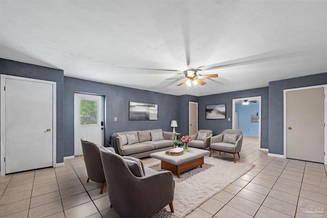 2382 Ryale Rd, Cantonment, FL 32533 - living area featuring light tile patterned flooring, a ceiling fan, and baseboards