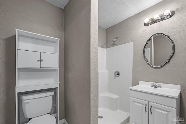 2382 Ryale Rd, Cantonment, FL 32533 - bathroom featuring a stall shower, toilet, and vanity