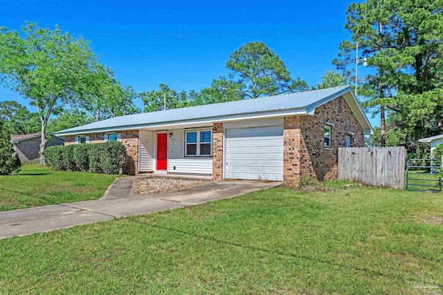 2382 Ryale Rd, Cantonment, FL 32533 - ranch-style home with brick siding, a garage, concrete driveway, and metal roof