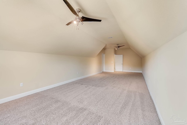 bonus room with carpet flooring, ceiling fan, and lofted ceiling