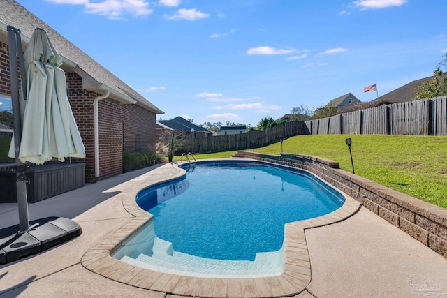 view of pool featuring a yard and a patio area