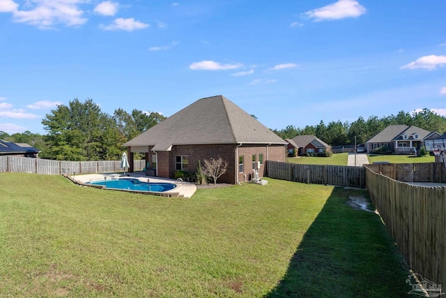 exterior space with a fenced in pool