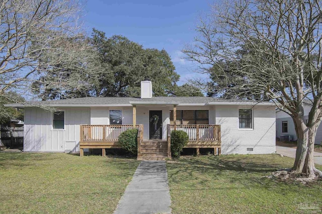 single story home with covered porch, a front yard, crawl space, brick siding, and a chimney