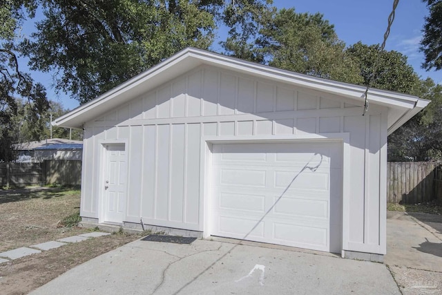 garage with fence