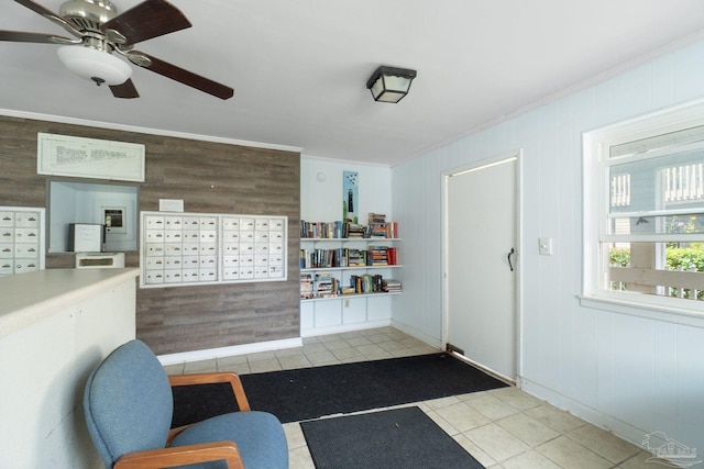 interior space featuring ceiling fan