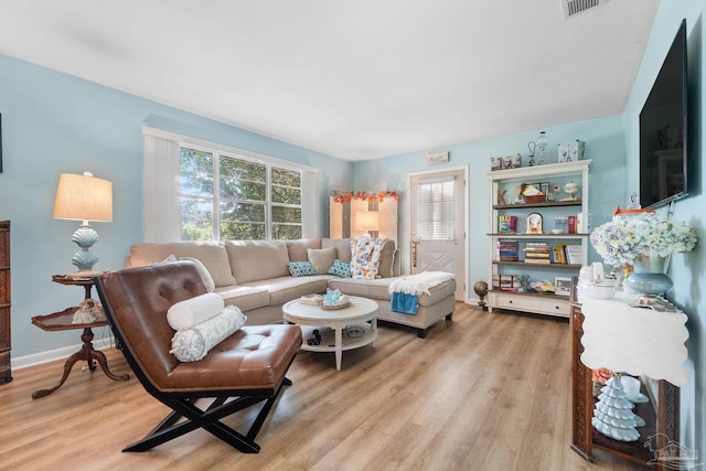 living room with hardwood / wood-style flooring