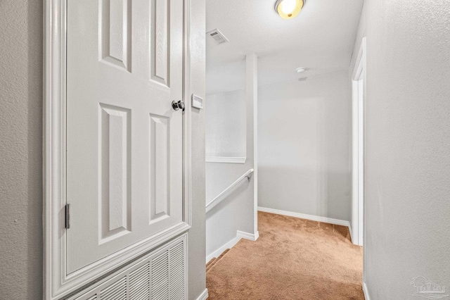 spacious closet featuring carpet and visible vents