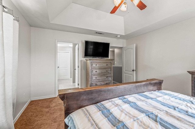 bedroom featuring baseboards, ceiling fan, carpet flooring, and visible vents