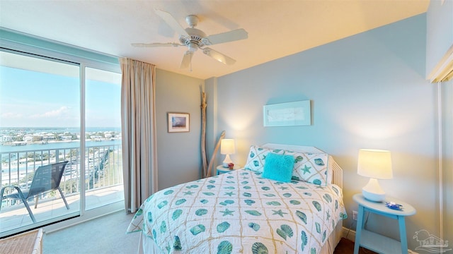 bedroom featuring carpet flooring, access to exterior, and ceiling fan