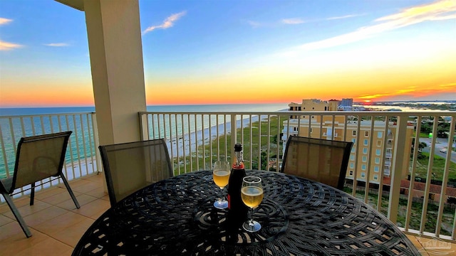 balcony at dusk with a water view