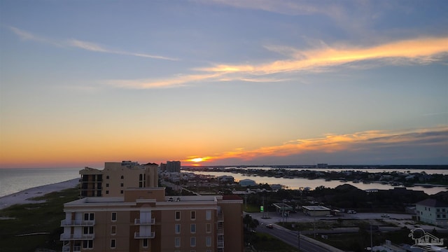 city view featuring a view of the beach and a water view