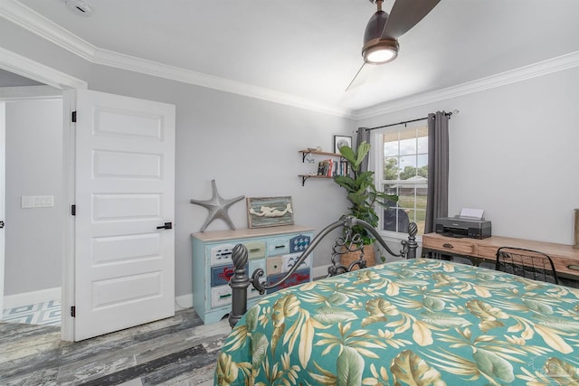 bedroom featuring ornamental molding, ceiling fan, and hardwood / wood-style floors