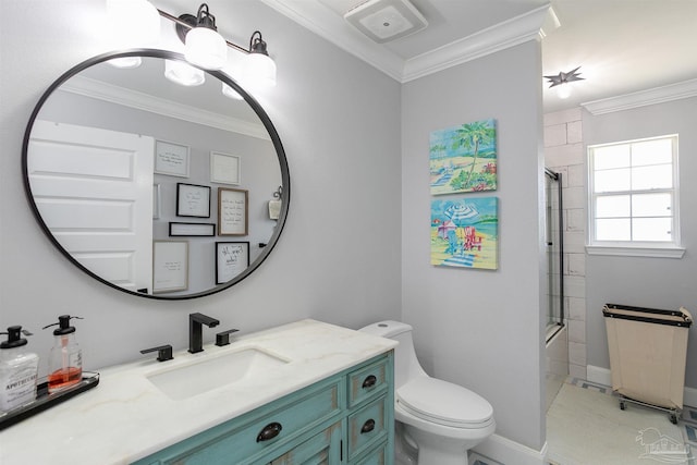 full bathroom featuring vanity, toilet, crown molding, and enclosed tub / shower combo