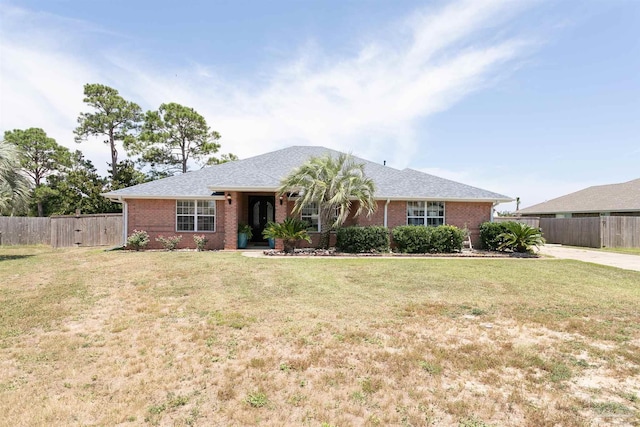 ranch-style home with a front yard