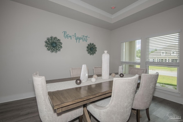 dining area featuring dark wood-style floors and baseboards