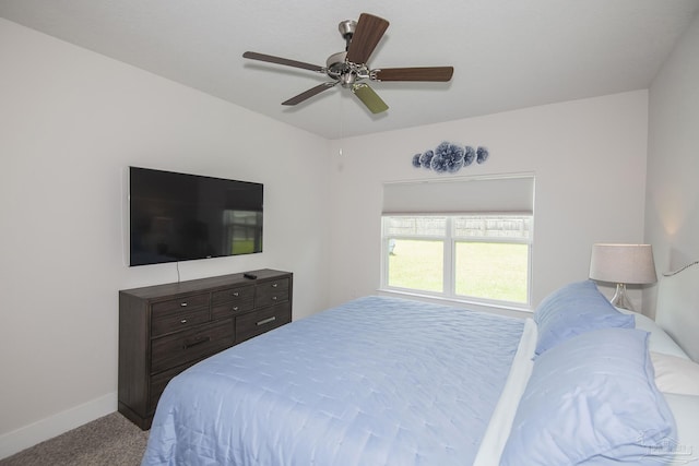 bedroom with carpet floors, ceiling fan, and baseboards