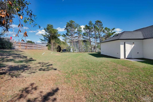 view of yard with fence