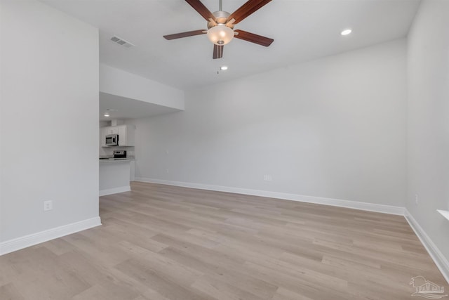 unfurnished living room featuring ceiling fan, recessed lighting, visible vents, baseboards, and light wood finished floors