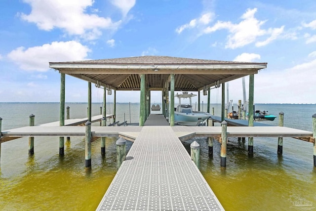 view of dock with a water view