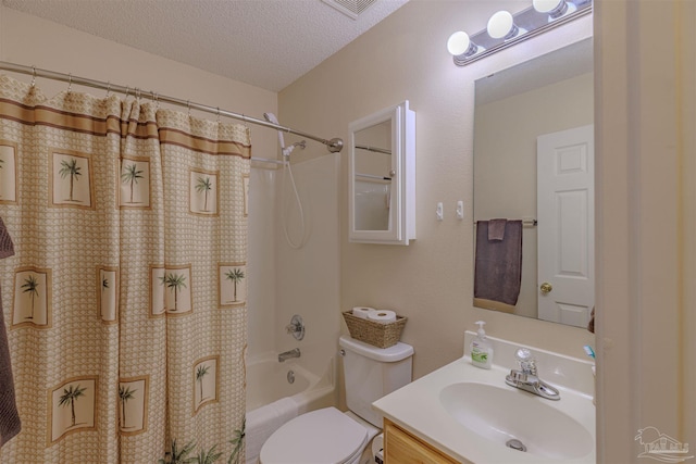 full bathroom featuring shower / bath combo, a textured ceiling, vanity, and toilet