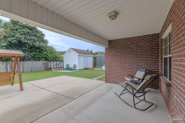 view of patio / terrace with a storage unit