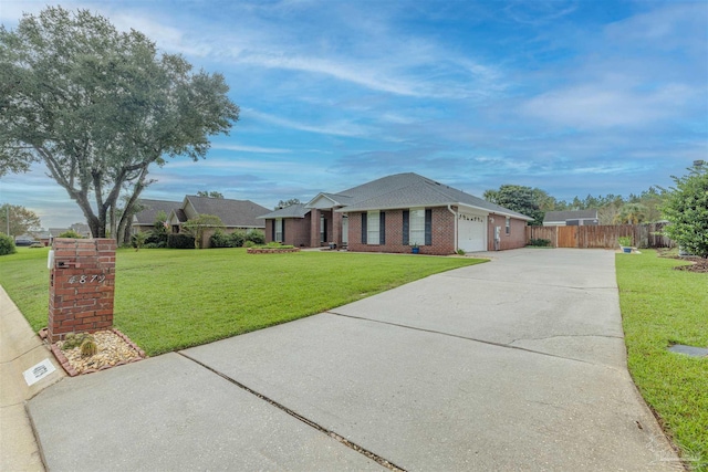 ranch-style home with a garage and a front lawn