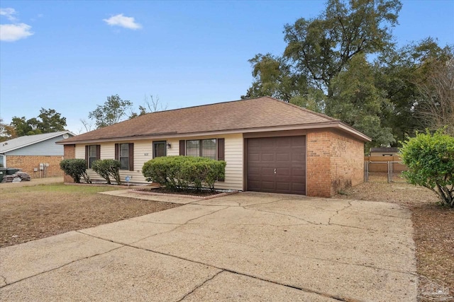 single story home featuring a garage