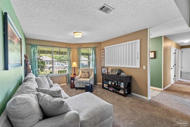917 Broken Arrow Ln, Pensacola, FL 32533 - carpeted living area featuring baseboards and a textured ceiling