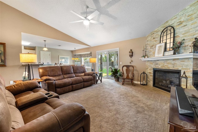 917 Broken Arrow Ln, Pensacola, FL 32533 - carpeted living room with a ceiling fan, vaulted ceiling, a fireplace, and a textured ceiling