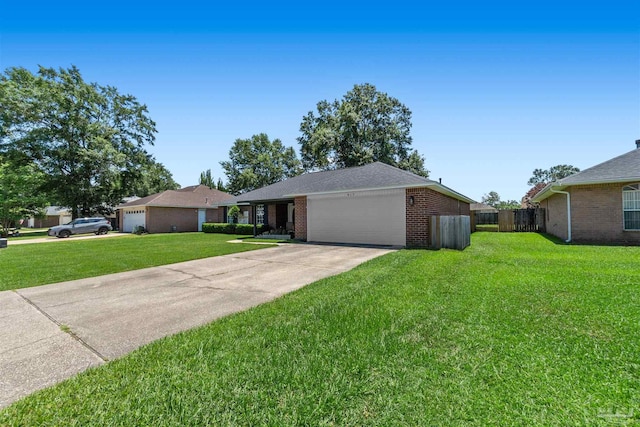 917 Broken Arrow Ln, Pensacola, FL 32533 - ranch-style home with an attached garage, driveway, and brick siding