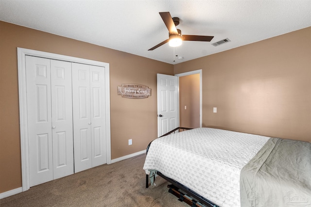 917 Broken Arrow Ln, Pensacola, FL 32533 - bedroom featuring carpet, a closet, baseboards, and a ceiling fan