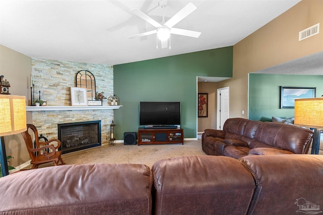 917 Broken Arrow Ln, Pensacola, FL 32533 - carpeted living area featuring a ceiling fan, lofted ceiling, a stone fireplace, and baseboards