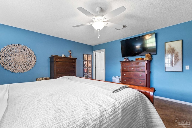 917 Broken Arrow Ln, Pensacola, FL 32533 - carpeted bedroom with baseboards, a textured ceiling, and ceiling fan