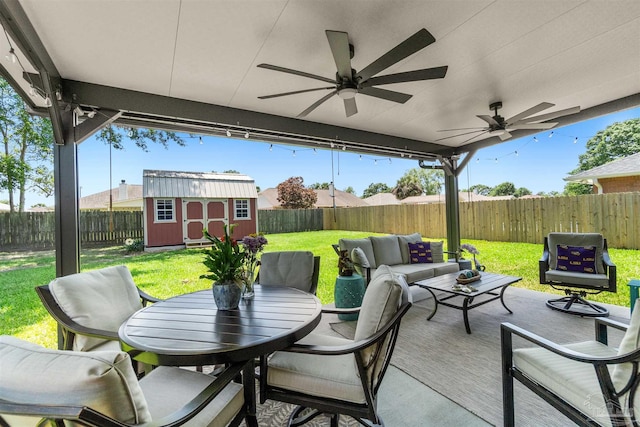 917 Broken Arrow Ln, Pensacola, FL 32533 - view of patio featuring an outdoor living space, a ceiling fan, a storage unit, and an outdoor structure