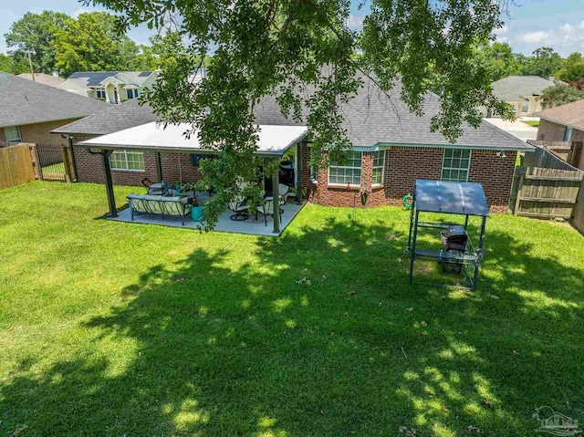 917 Broken Arrow Ln, Pensacola, FL 32533 - view of yard with a patio area