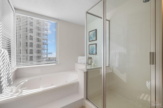 bathroom featuring toilet, a textured ceiling, and plus walk in shower