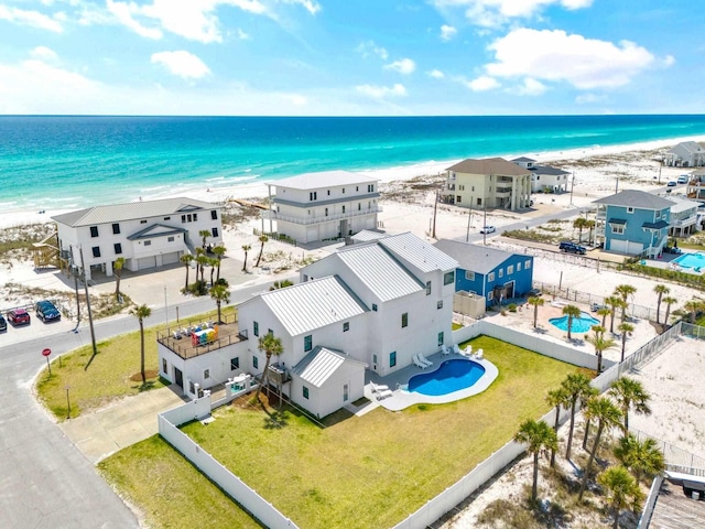 drone / aerial view with a view of the beach and a water view