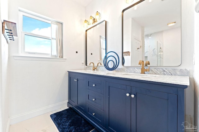 bathroom featuring plenty of natural light and vanity