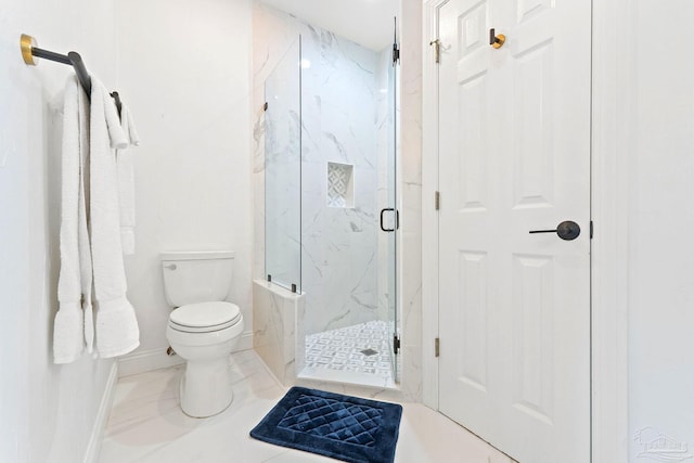 bathroom with walk in shower and toilet