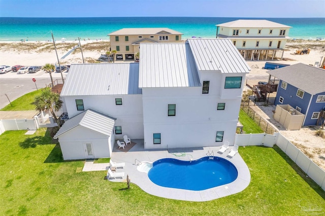 exterior space with a view of the beach and a water view