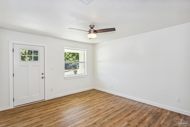 foyer with ceiling fan and hardwood / wood-style flooring