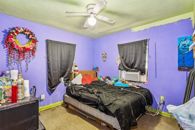 bedroom featuring cooling unit, ceiling fan, and carpet flooring