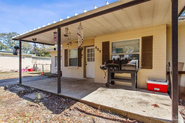 view of patio with a grill