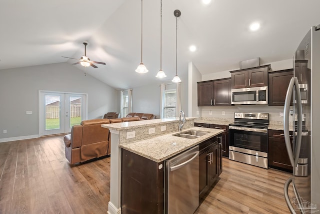 5726 Dunridge Dr, Pace, FL 32571 - kitchen featuring stainless steel appliances, a sink, open floor plan, ceiling fan, and lofted ceiling