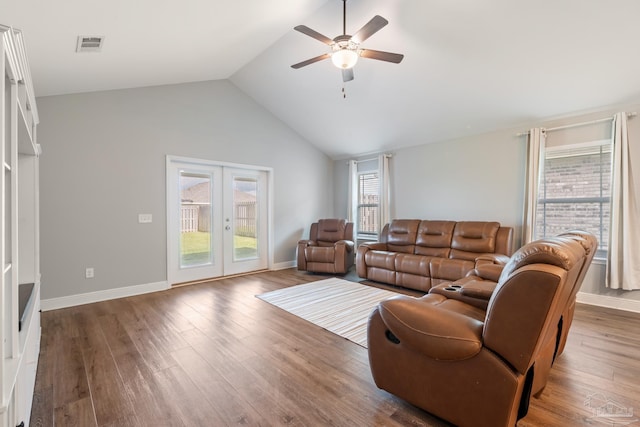 5726 Dunridge Dr, Pace, FL 32571 - living area with french doors, ceiling fan, wood finished floors, vaulted ceiling, and baseboards