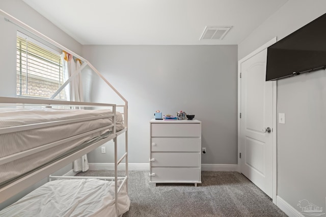5726 Dunridge Dr, Pace, FL 32571 - carpeted bedroom with baseboards