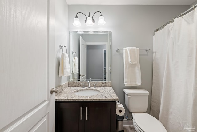 5726 Dunridge Dr, Pace, FL 32571 - bathroom with toilet, vanity, and a shower with shower curtain