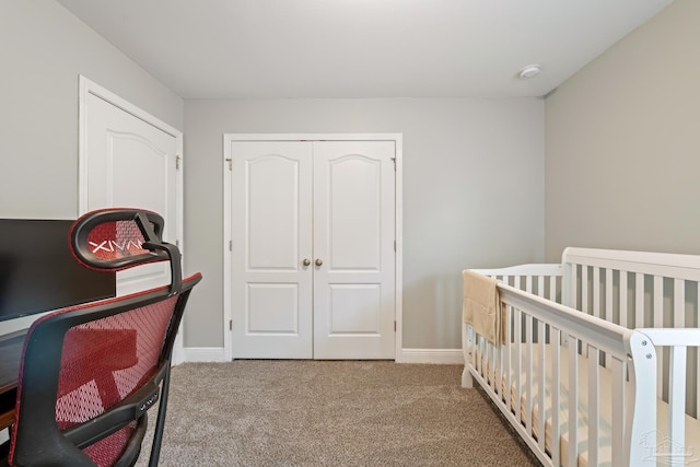 5726 Dunridge Dr, Pace, FL 32571 - bedroom with carpet flooring, baseboards, a closet, a crib, and a desk